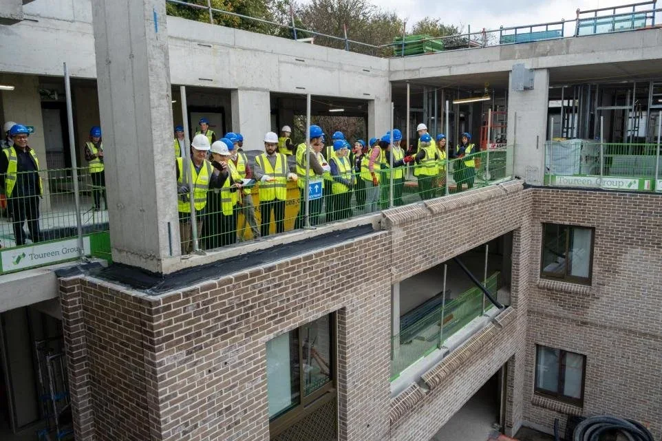Construction site group photograph at the Highgate East development